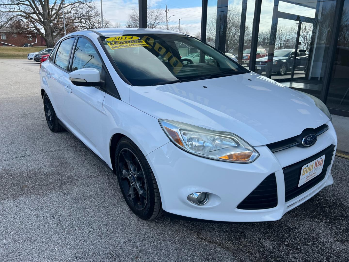2014 Oxford White Ford Focus SE Sedan (1FADP3F26EL) with an 2.0L L4 DOHC 16V engine, 6-Speed Automatic transmission, located at 1633 W Kimberly, Davenport, IA, 52806, (563) 323-5341, 41.559456, -90.598732 - Photo#2